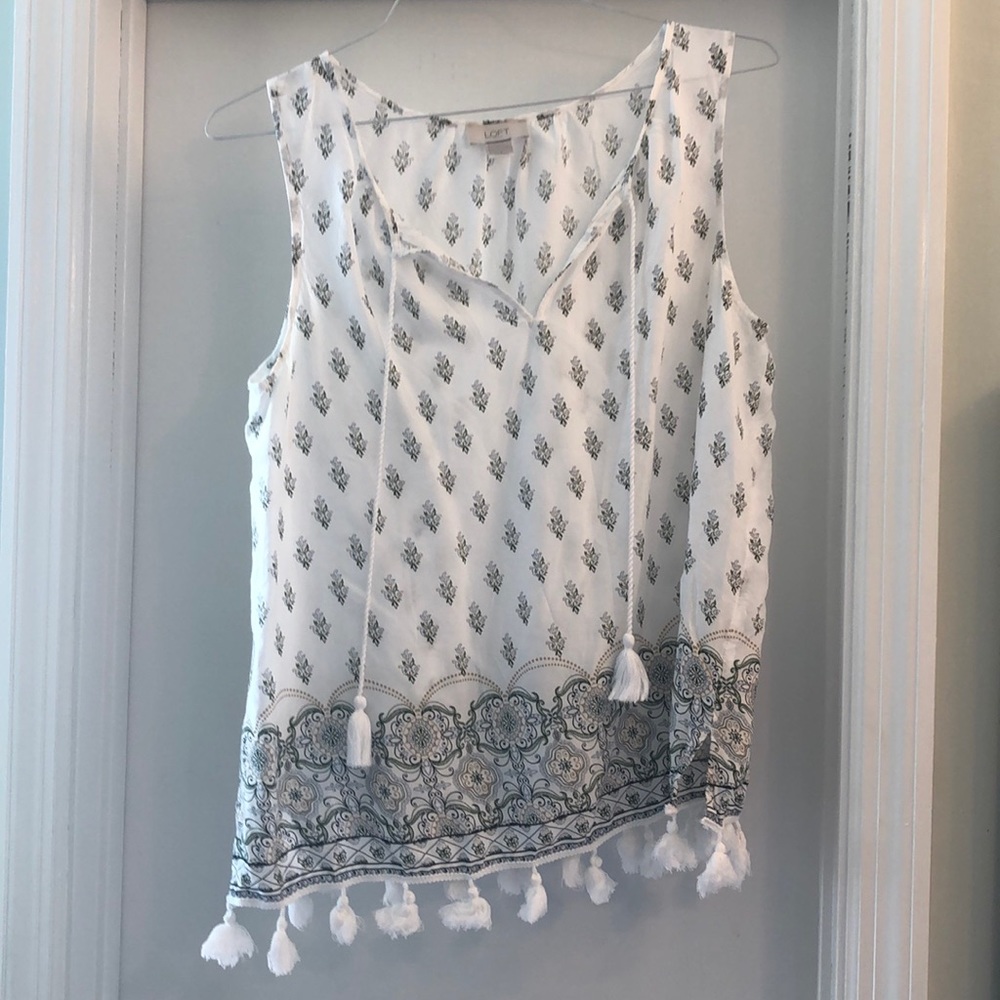 Loft, sleeveless tops with fringe.